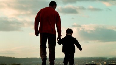 father and son walking