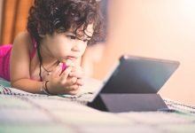 child with tablet