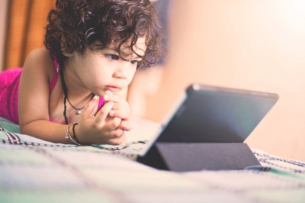 child with tablet