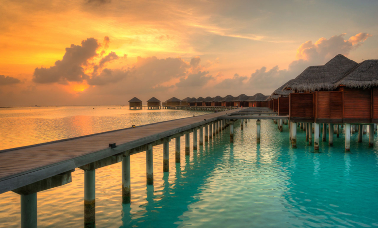 Maldives ocean beach sunset