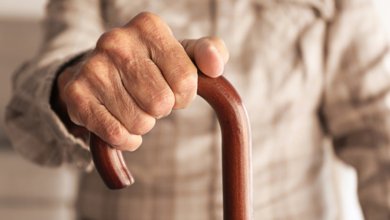 old man walking stick ageing senior citizen shut