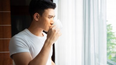 young man drink coffee home 1150 14240